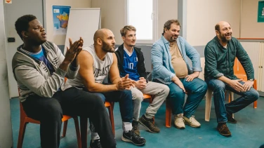 Un triomphe film trailer button