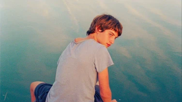 Strange River film trailer button