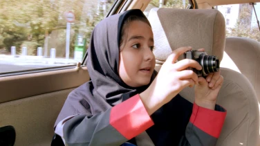 Taxi teheran film trailer button