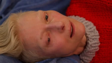 The Room Next Door film trailer button